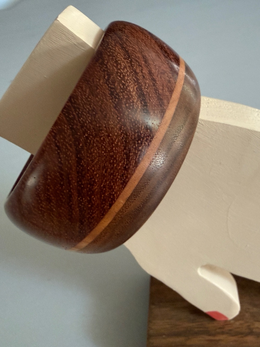 Bangle, made with bubinga, maple and walnut.
